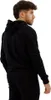 A man wearing a black hoodie and pants, shown from the side. Produktbild-Vorschau