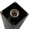 Close-up view of the inside of a black outdoor lamp fixture, showing the E27 socket. Produktbild-Vorschau