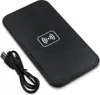 A black wireless charger with a USB cable is shown on a white background. Produktbild-Vorschau