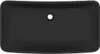 A top-down view of a rectangular, matte black ceramic sink with a central drain hole. Náhled obrázku produktu