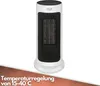 A white tower heater with a black mesh front, set against a white background. A brown, textured overlay with white text is present at the bottom. Podgląd zdjęcia produktu