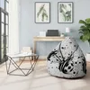 A modern living room with a bean bag chair, a coffee table, and a desk. Voir les images du produit