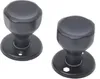 Two black door knobs with round rosettes are shown against a white background. Podgląd zdjęcia produktu