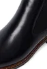 A close-up view of a black leather Chelsea boot. Produktbild-Vorschau
