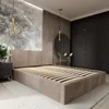 A bedroom scene featuring a bed frame with a slatted base, a headboard, and surrounding furniture and decor. Produktbild-Vorschau