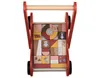 A red wooden walker filled with colorful blocks featuring woodland animals and nature designs. Produktbild-Vorschau