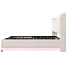 Side view of a beige upholstered bed frame with a tufted headboard and pink LED lighting. Produktbild-Vorschau