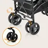 Close-up view of the wheels of a stroller, with an inset showing a 360-degree rotation. Produktbild-Vorschau