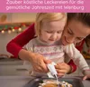A mother and child are decorating gingerbread cookies with icing. Anteprima dell’immagine prodotto