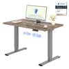 A standing desk with a computer, keyboard, and cup on it, with diagrams of its lifting mechanism. Anteprima dell’immagine prodotto
