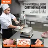 A chef using a commercial bone cutting machine in a kitchen, with images of different types of meat and fish displayed below. Náhľad obrázku produktu