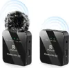 Two black wireless microphones, one with a furry windscreen, are displayed against a white background. Blue concentric circles emanate from the top of each microphone, suggesting wireless transmission. Náhled obrázku produktu