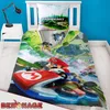 A Mario Kart themed duvet cover and pillowcase set on a bed. Produktbild-Vorschau