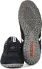 A pair of navy blue Geox sneakers, one shown from the front and the other from the sole. Anteprima dell’immagine prodotto