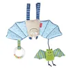 A baby toy designed to hang from a car seat or stroller. Produktbild-Vorschau