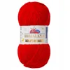 A ball of red yarn with a label. Podgląd zdjęcia produktu