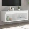 A white wall-mounted TV cabinet with decorative items on top and inside. Anteprima dell’immagine prodotto
