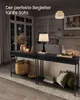 A living room scene at night, featuring two console tables with decorative items and a fireplace in the background. Produktbild-Vorschau