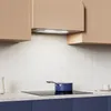 A modern kitchen scene with a range hood installed above a stovetop. Náhled obrázku produktu