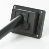 Close-up view of the back of a black solar light fixture with a pipe attached. Podgląd zdjęcia produktu