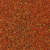 A close-up, top-down view of small, granular fish food. Anteprima dell’immagine prodotto