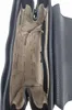 The inside of an open black handbag is shown. Produktbild-Vorschau