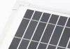 A close-up view of a solar panel with its grid of photovoltaic cells. Produktbild-Vorschau