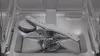 The interior of a dishwasher, showing the spray arm, filter, and detergent dispenser. Produktbild-Vorschau