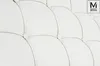 A close-up view of a white tufted upholstery, likely a chair or sofa. Náhľad obrázku produktu