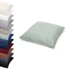 A stack of pillowcases in various colors is shown on the left, with a single mint green pillowcase prominently displayed on the right. Produktbild-Vorschau