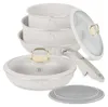 A set of white cookware with gold accents, including pots, a pan, a detachable handle, and lids, arranged on a white background. Produktbild-Vorschau