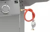 Close-up of a gas grill's connection point for a propane tank, showing the regulator and hose. Náhled obrázku produktu
