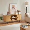 A living room scene featuring a TV stand with decorative items and artwork. Náhľad obrázku produktu