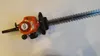 A Stihl hedge trimmer is shown on a plain background. Produktbild-Vorschau