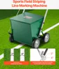 A green sports field line marking machine is shown on a green field with white lines. Anteprima dell’immagine prodotto