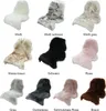 A collage of different colored sheepskin rugs, each labeled with its color in German. Náhled obrázku produktu