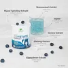 A product shot of a supplement container with surrounding ingredients and a glass of blue liquid. Produktbild-Vorschau