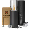 A product shot of a freestanding ethanol fireplace with its packaging and accessories, set against a white background. Produktbild-Vorschau