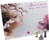 An advent calendar with a woman's face and flowers, along with some beauty products. Produktbild-Vorschau