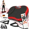 A woman is using a vibration plate, with accessories and a remote control shown. Podgląd zdjęcia produktu