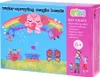 The image shows the front of a product box for a water-spraying magic beads craft kit. The box features colorful illustrations of beads forming various shapes like an elephant, rockets, a cupcake, a crab, and a butterfly. It also includes text describing t Náhľad obrázku produktu