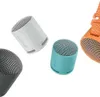 Four colorful Sony Bluetooth speakers are arranged diagonally on a white background. Voir les images du produit