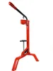 A red bottle capper stands on a white background. Anteprima dell’immagine prodotto