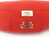 A close-up of a red meditation cushion with a label and a lotus flower with a meditating figure embroidered on it. Produktbild-Vorschau