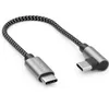 A close-up studio shot of a USB-C to USB-C cable with a 90-degree angled connector. Produktbild-Vorschau