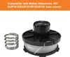A string trimmer spool and a spring are shown against a white background. Náhled obrázku produktu