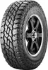 A close-up studio shot of a Cooper Discoverer ST Maxx tire mounted on a black alloy wheel. Podgląd zdjęcia produktu