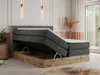 A king-size bed with its storage compartment open, showcasing the interior and the mattress mechanism. Produktbild-Vorschau