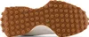 The image shows the sole of a New Balance sneaker. Voir les images du produit