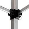 A close-up view of the corner joint of a pop-up tent frame, showing the aluminum poles and a black plastic connector with a metal pin and ring. Produktbild-Vorschau